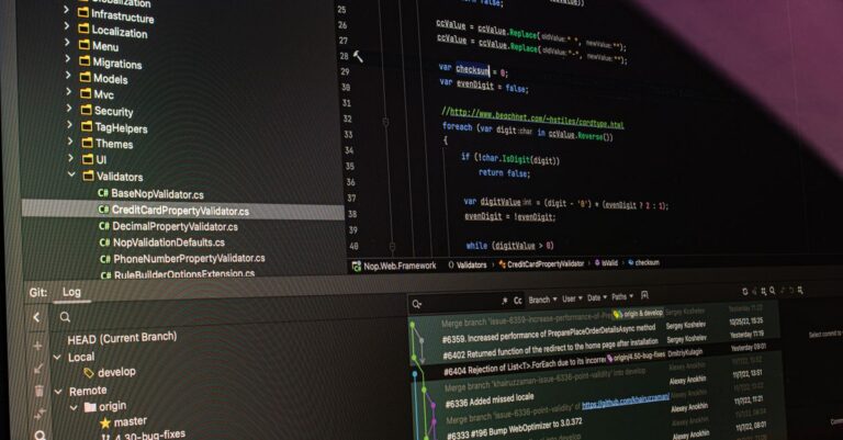 Close-up of software development tools displaying code and version control systems on a computer monitor.