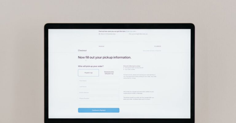 A laptop displaying an online checkout form, highlighting technology and e-commerce.