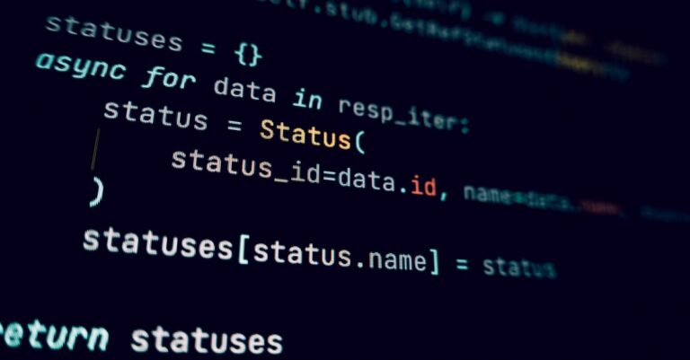 Detailed view of programming code in a dark theme on a computer screen.
